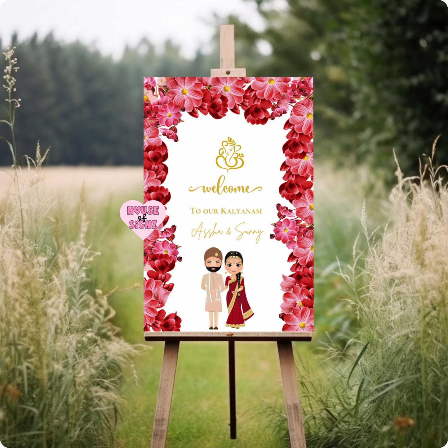 Wedding pink flowers surrounded welcome sign